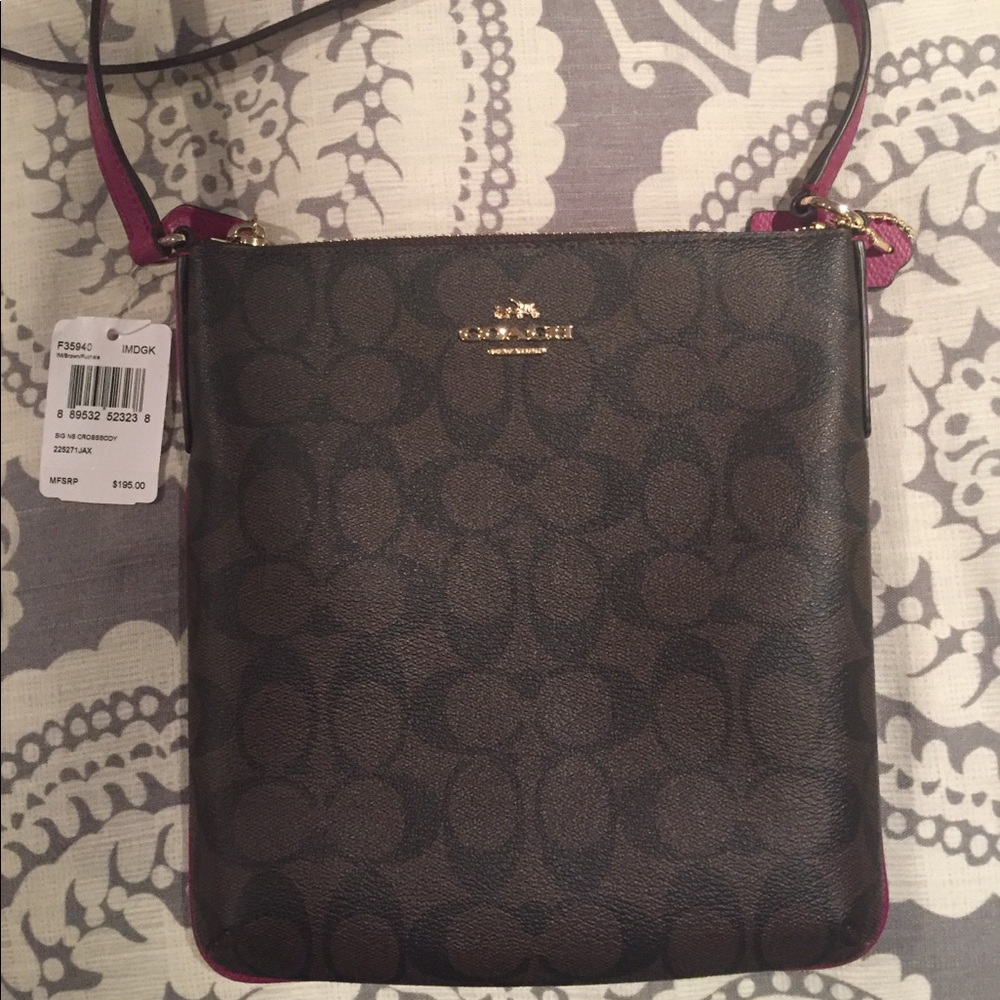 Coach purse. 8” x 9”
